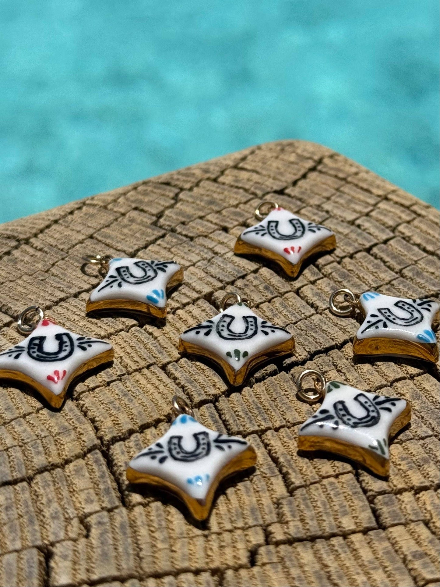 Horseshoe 4-Point Star Charm: Red Accent / Gold Luster