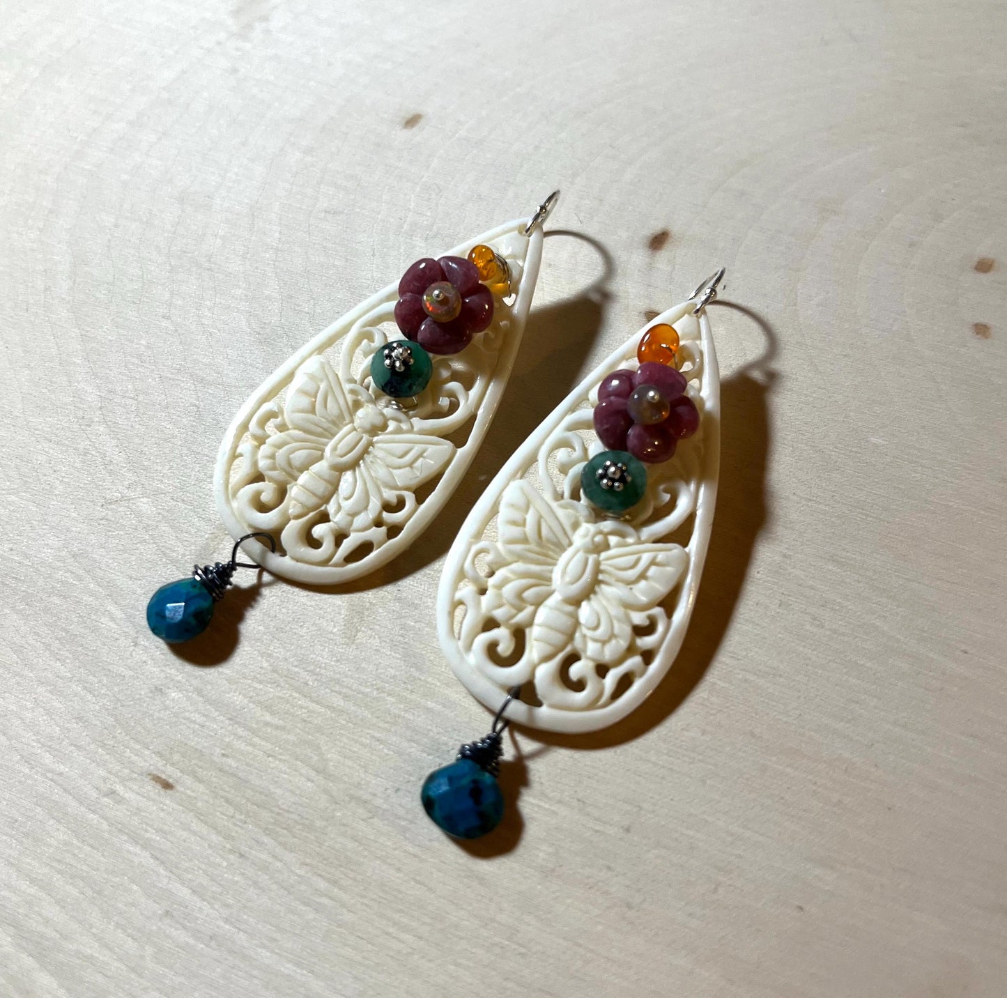 Carved butterfly earrings with azurite, gemstone flowers, opals and wire wrapped with sterling silver