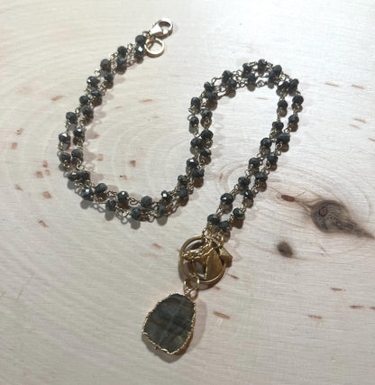 Antique French goldfilled horse pendant with pyrite and labradorite