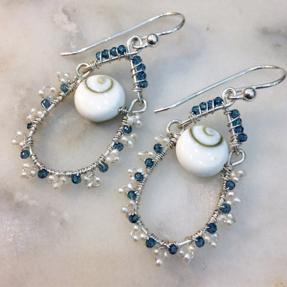 Blue topaz, pearl and lucky eye shell earrings wire wrapped with sterling silver