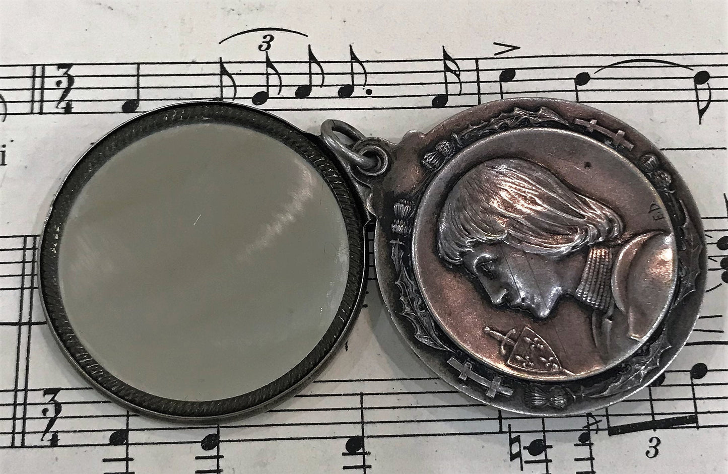 Antique French Art Nouveau Joan of Arc Thistle Sliding Mirror Pendant c1900