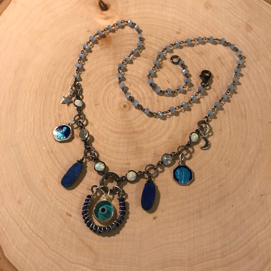 Third Eye protection necklace is made with lapis, opals, blue topaz, blue chalcedony, antique French enamel medals