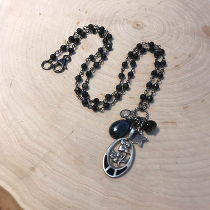 Four Petal Flower necklace with black tourmaline, enamel and sterling silver