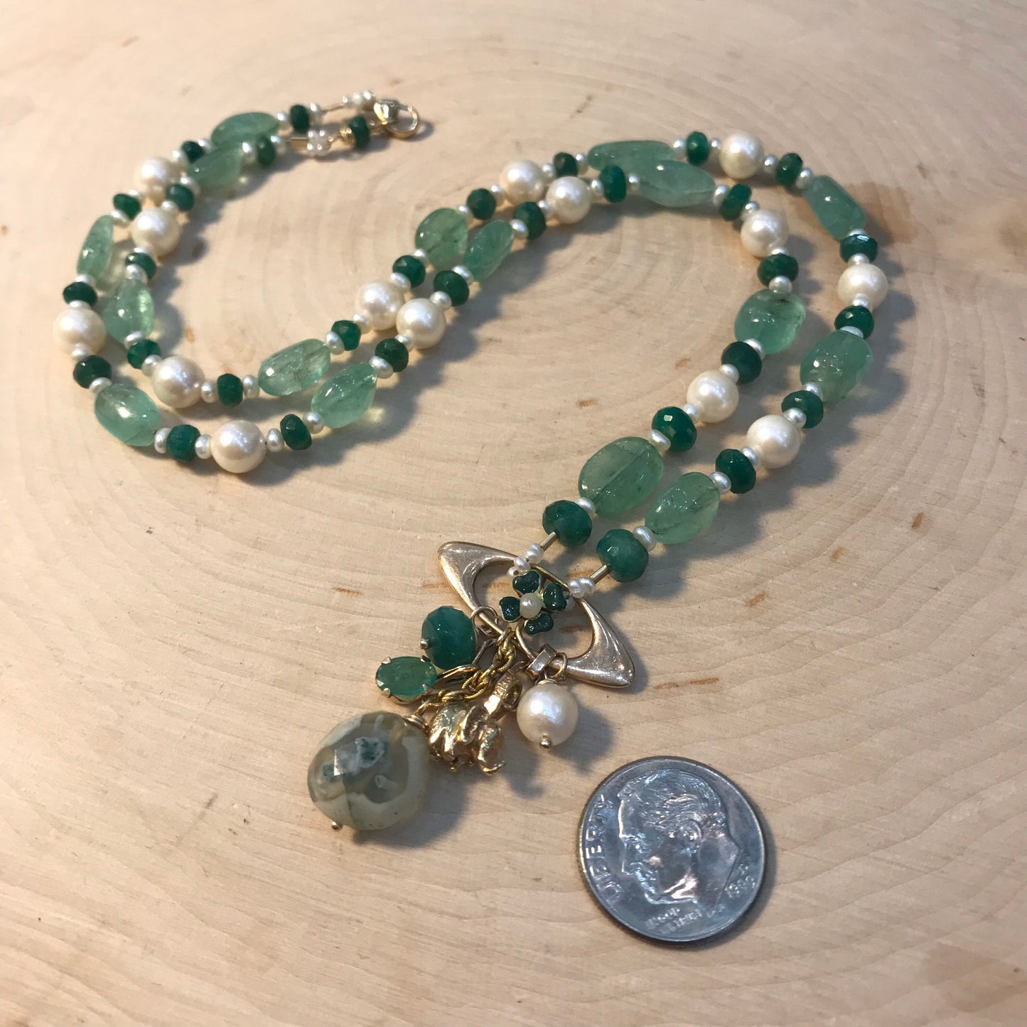 Art Nouveau 14 gold Good Luck necklace with enamel 4 leaf clover, gold elephant, emeralds and pearls