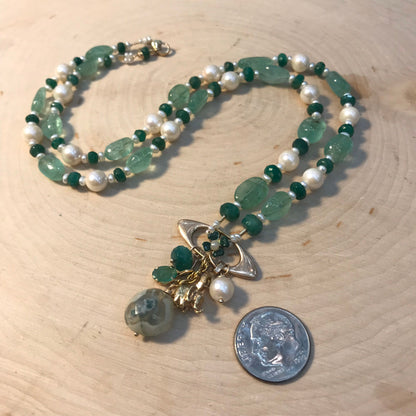 Art Nouveau 14 gold Good Luck necklace with enamel 4 leaf clover, gold elephant, emeralds and pearls