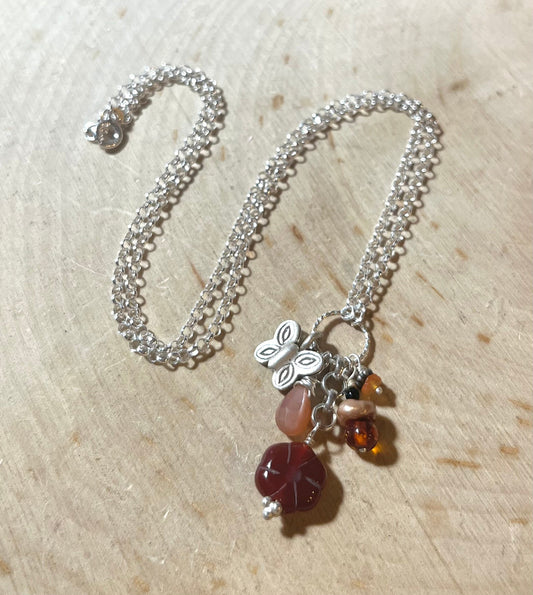 Butterfly Necklace with carnelian flower, peach moonstone, amber, pearls