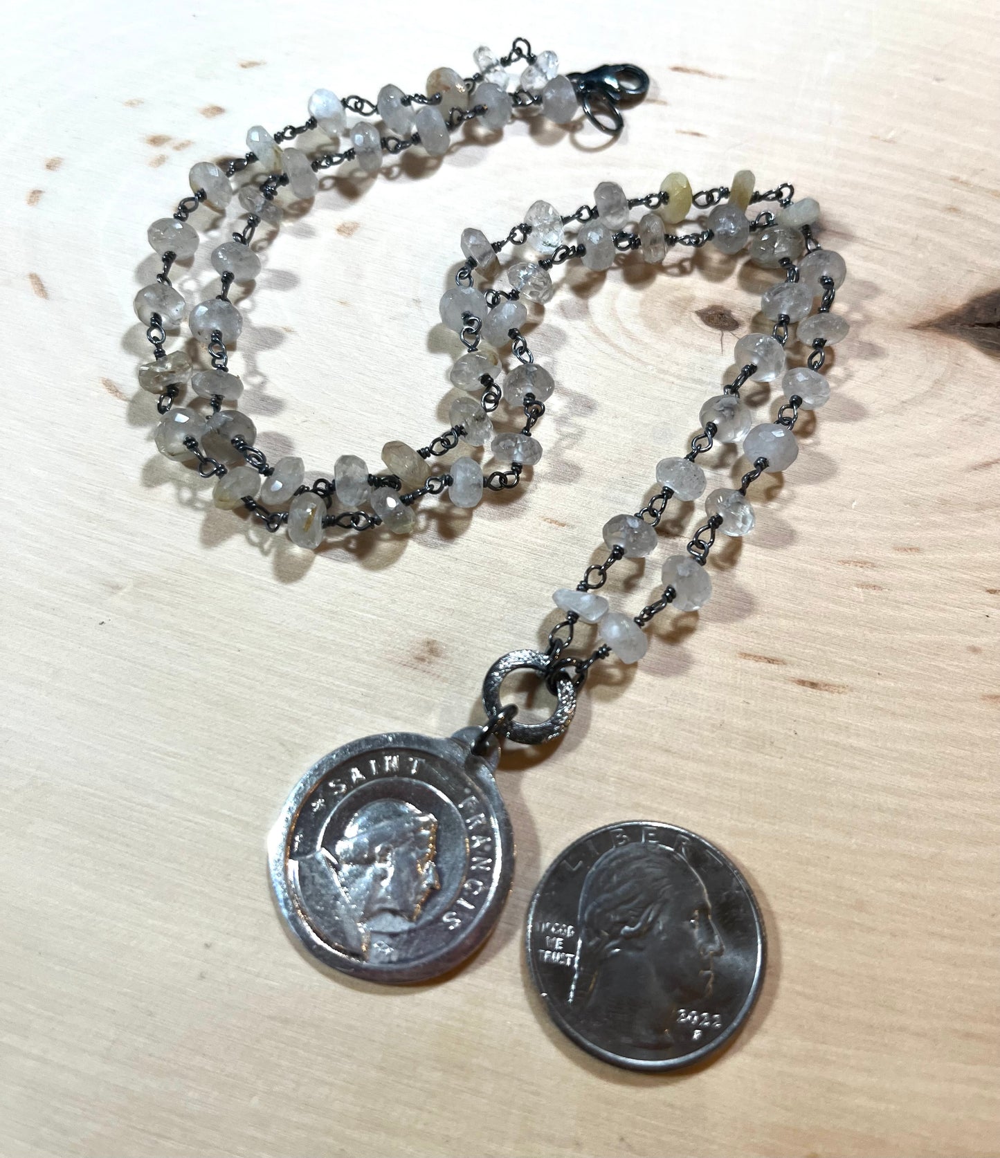 Vintage Saint Francis/Saint Anthony necklace with rutilated quartz