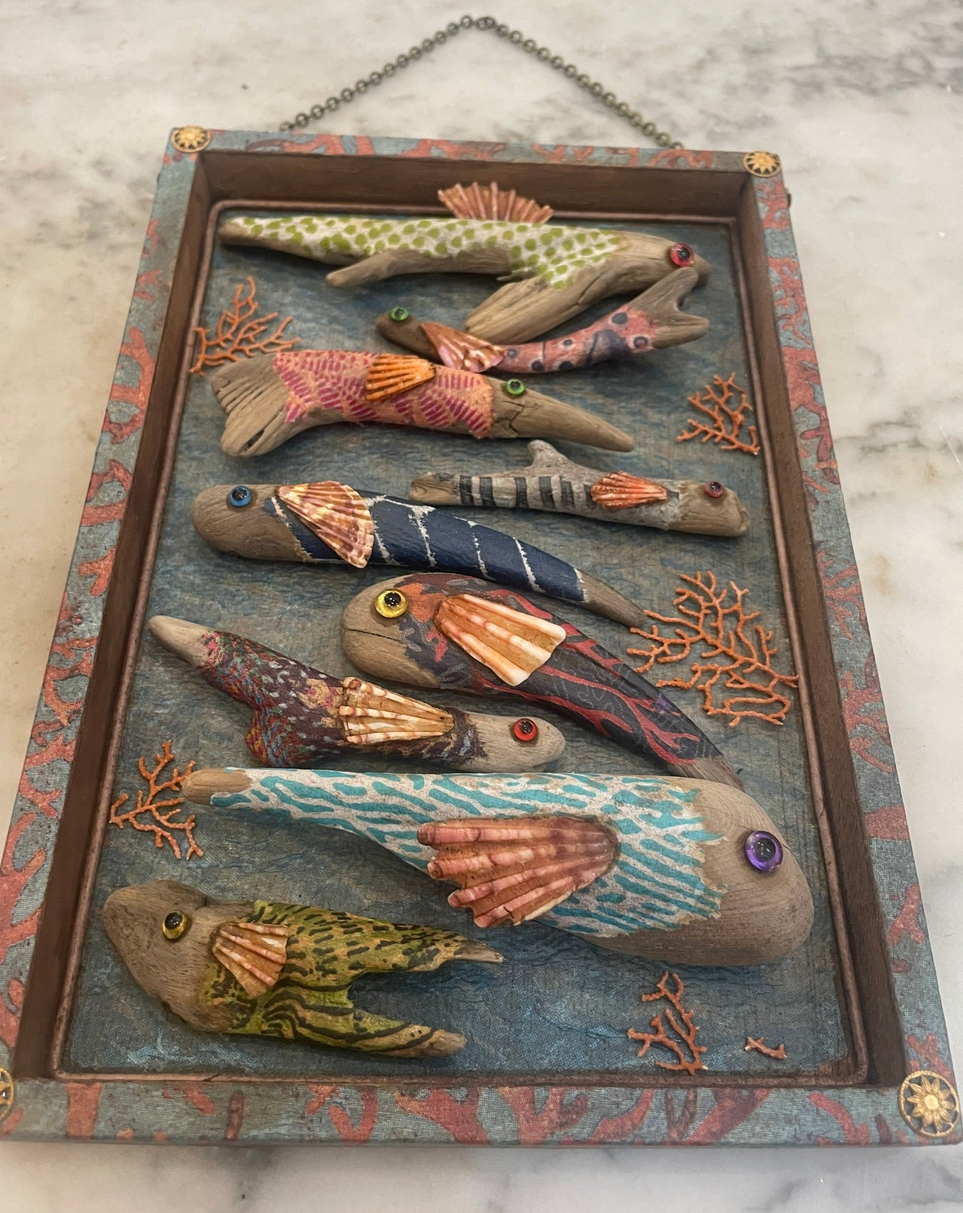 Wooden Fish Assemblage by Nancy Nelson