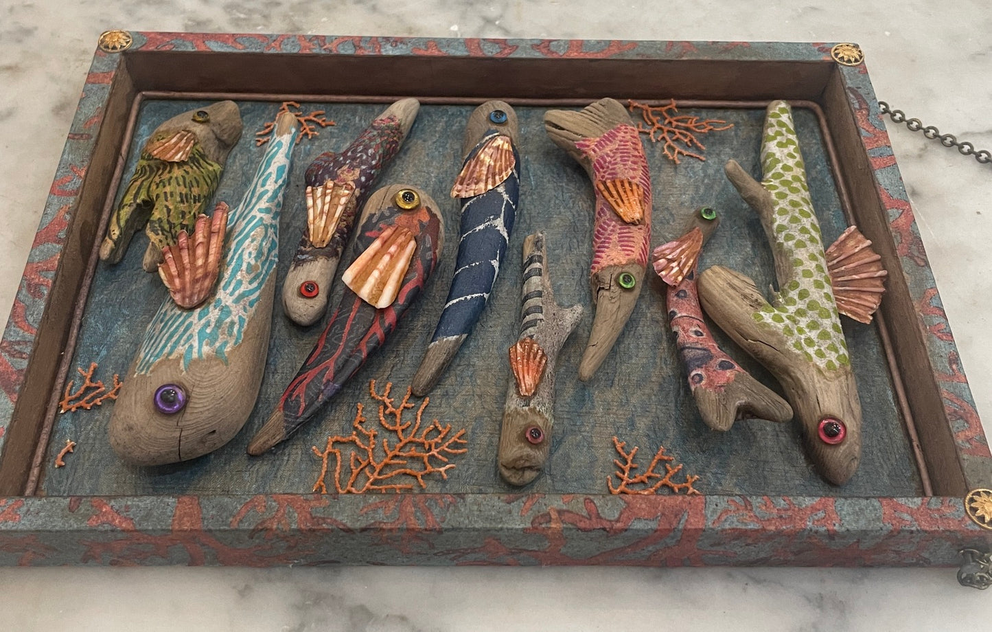 Wooden Fish Assemblage by Nancy Nelson