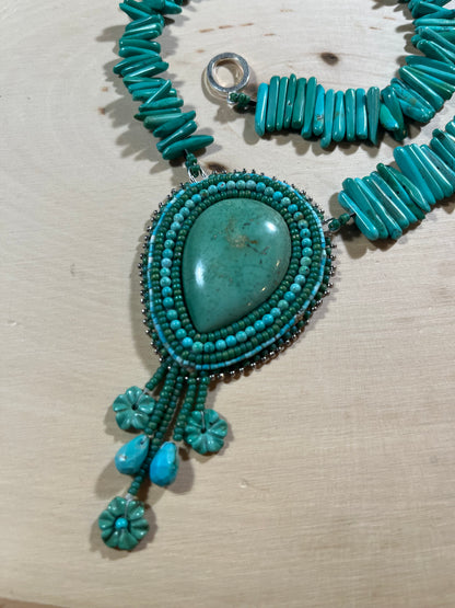 Turquoise beaded necklace with flower drops