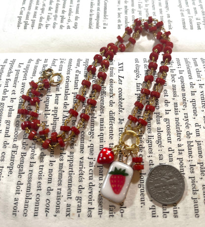 Strawberry necklace with Sha Parle pottery charm, coral, enamel charm and 14k gold-filled