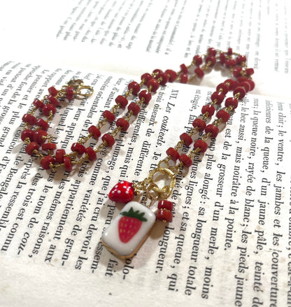 Strawberry necklace with Sha Parle pottery charm, coral, enamel charm and 14k gold-filled