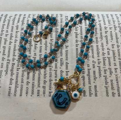Horseshoe necklace with Sha Parle pottery charm, turquoise, enamel charm and 14k gold-filled