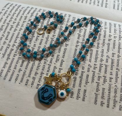 Horseshoe necklace with Sha Parle pottery charm, turquoise, enamel charm and 14k gold-filled