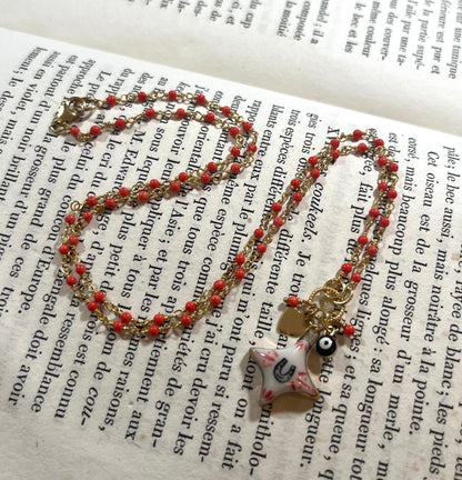 Horseshoe Star necklace with Sha Parle pottery charm, coral, evil eye charm and 14k gold-filled