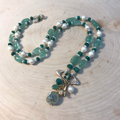 Art Nouveau 14 gold Good Luck necklace with enamel 4 leaf clover, gold elephant, emeralds and pearls