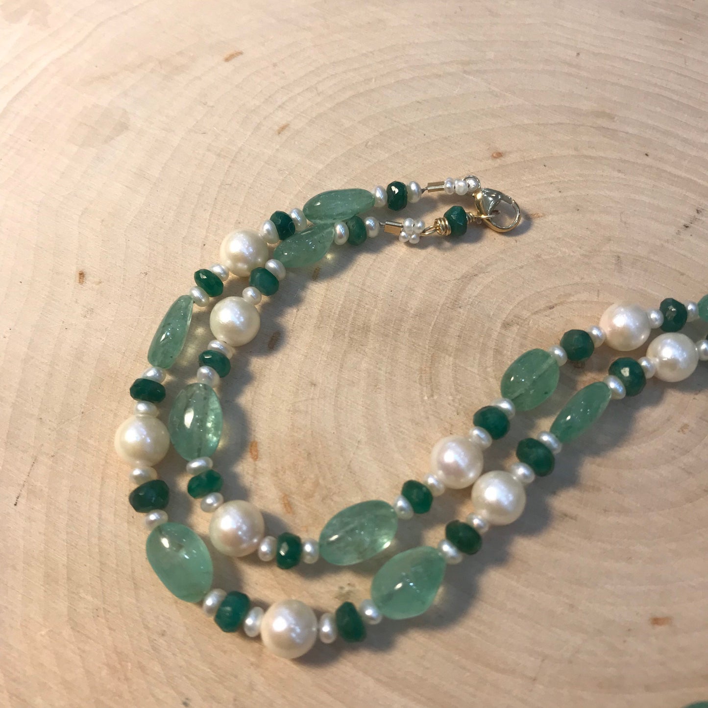 Art Nouveau 14 gold Good Luck necklace with enamel 4 leaf clover, gold elephant, emeralds and pearls