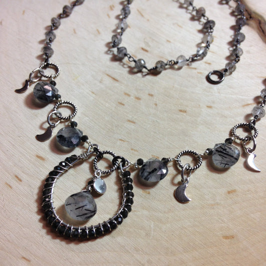 Moonphase wire wrapped necklace with rutilated quartz and sterling silver
