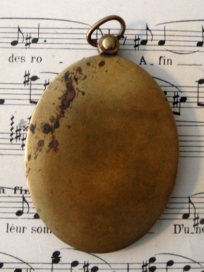 Antique French Art Nouveau sliding mirror pendant with enameled shield c1910